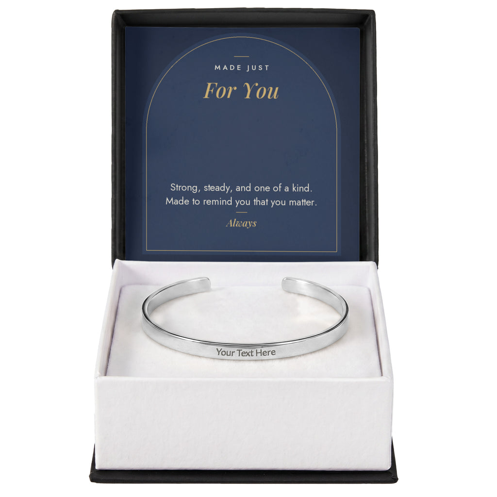 Polished stainless steel men's custom engraved cuff bracelet with Made Just For You message card in standard gift box
