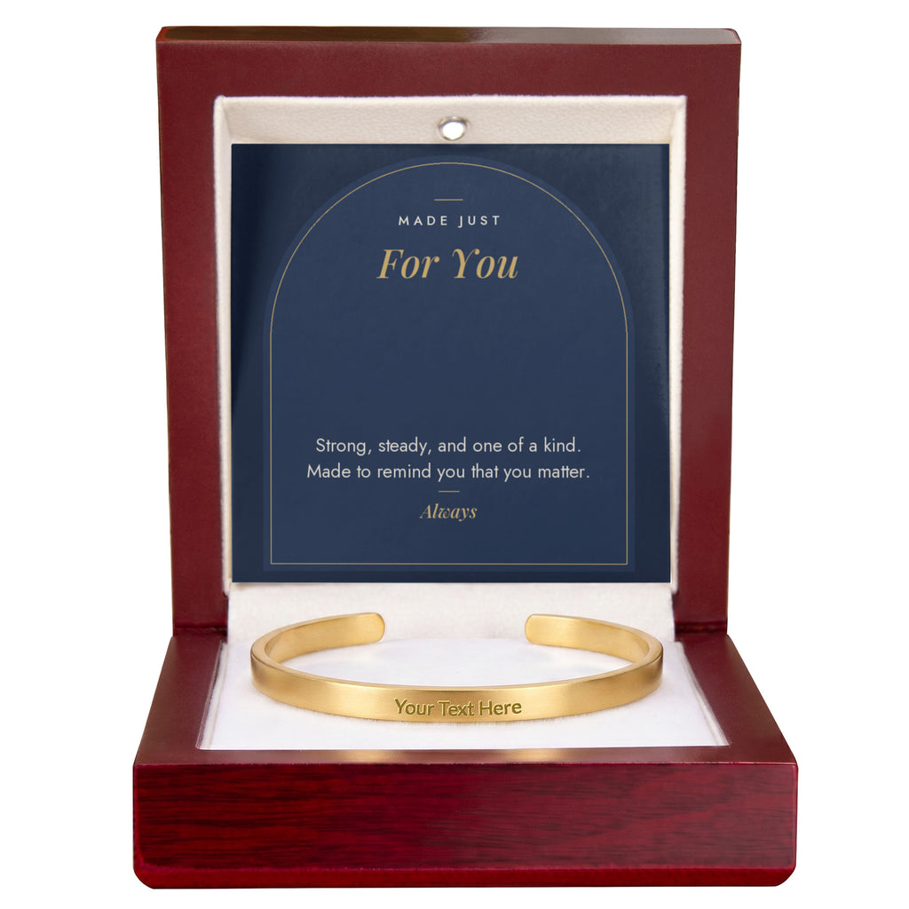 Gold men's custom engraved cuff bracelet with Made Just For You message card in mahogany LED luxury box