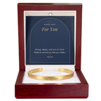 Gold men's custom engraved cuff bracelet with Made Just For You message card in mahogany LED luxury box