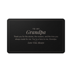 Engraved metal wallet card for grandpa held in hand