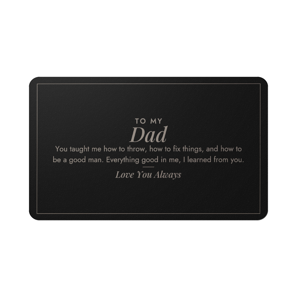Engraved metal wallet card for boy dad held in hand