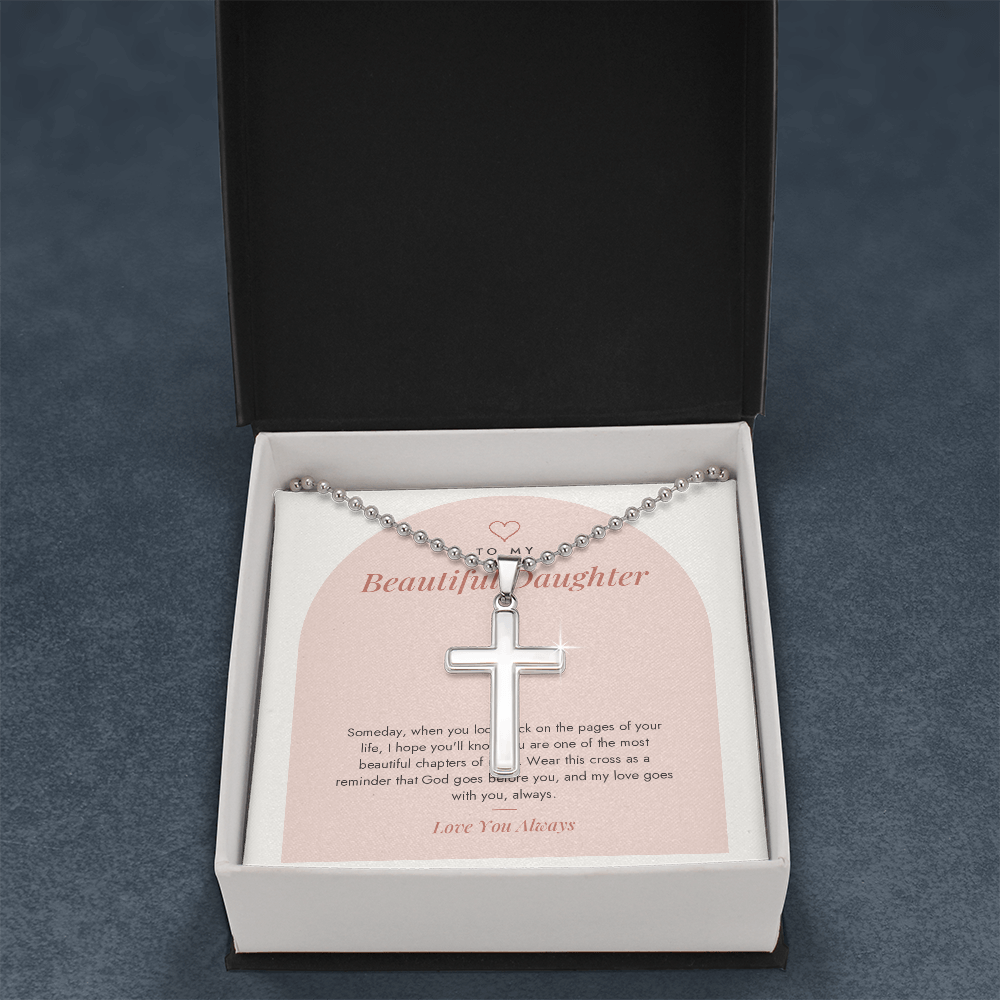 Cross necklace for daughter on Chapters card in gift box, close-up