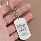 Engraved dog tag keychain for Son, stainless steel close-up in hand