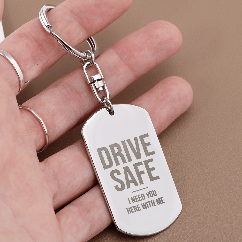 Engraved dog tag keychain for Son, stainless steel close-up in hand