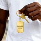 Engraved dog tag keychain for Husband, 18K gold finish held in hand