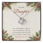 Love Knot necklace for Daughter laid on classic "The Brightest Light on Our Tree" message card