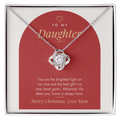 Love Knot necklace for Daughter laid on modern "The Brightest Light on Our Tree" message card