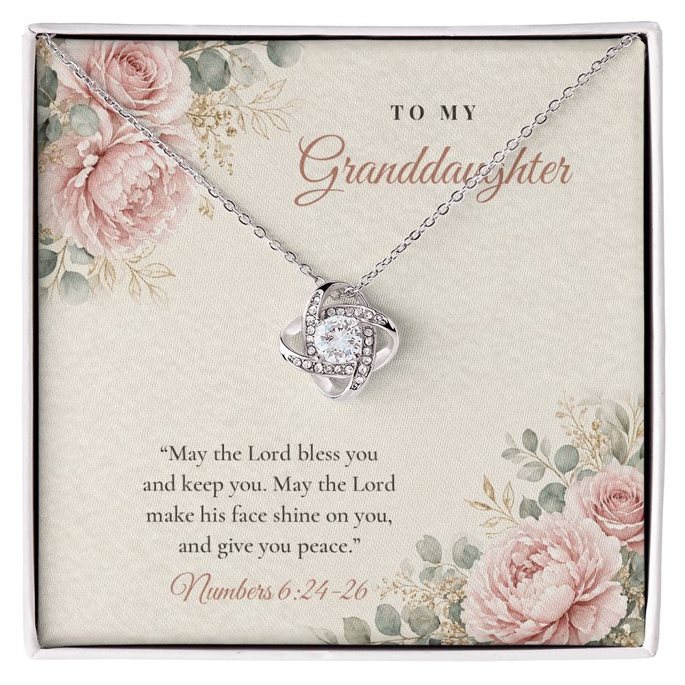 Christian Love Knot necklace for Granddaughter laid on "To My Granddaughter" Numbers 6:24-26 message card
