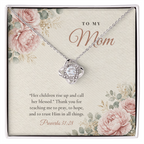 Christian Love Knot necklace for Mom laid on "To My Mom" Proverbs 31:28 message card