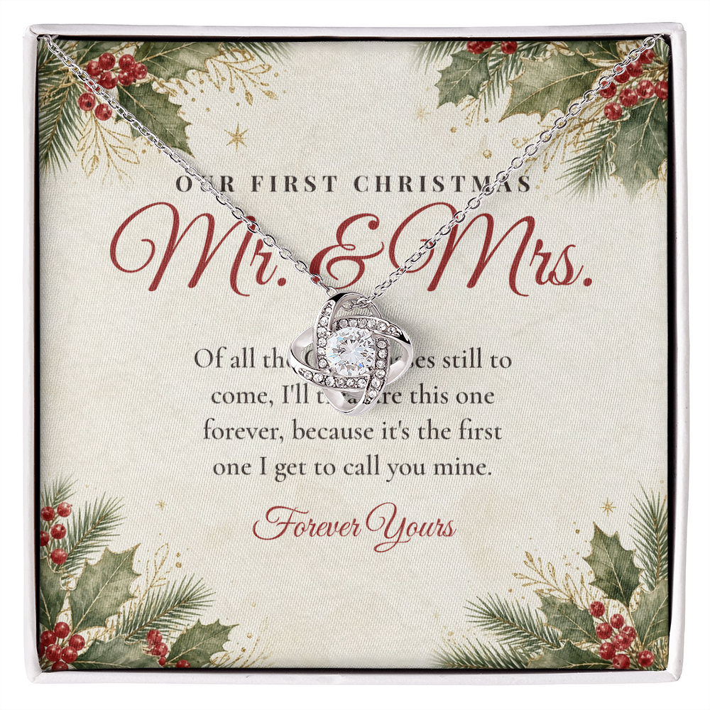 Silver Love Knot necklace for wife displayed on Our First Christmas Mr. & Mrs. message card