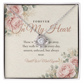 Silver memorial Love Knot necklace displayed on Forever In My Heart message card