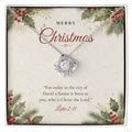 Christian Christmas Love Knot necklace laid on "Merry Christmas" Luke 2:11 message card