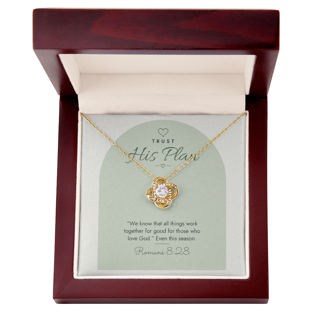 18K yellow gold finish Christian Love Knot necklace in mahogany luxury gift box with lid open, "Trust His Plan" Romans 8:28 modern message card