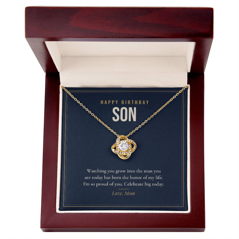 18K yellow gold finish Birthday Love Knot necklace for Son in mahogany luxury gift box with lid open, "Happy Birthday Son" message card