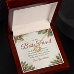 Yellow gold Love Knot necklace for best friend and To My Best Friend message card in open mahogany luxury box on dark background