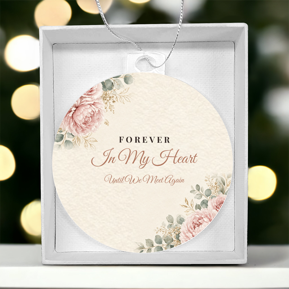 Acrylic bulb ornament with Forever In My Heart design in gift box with Christmas lights