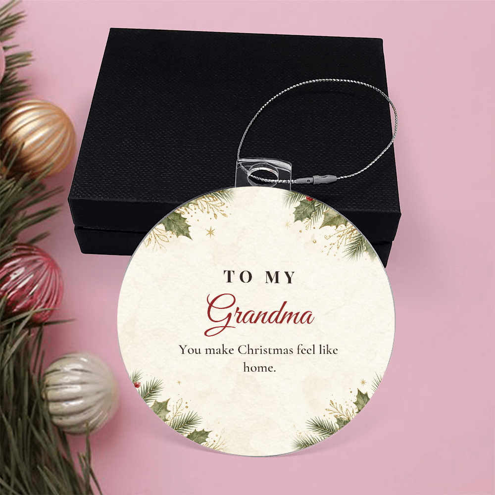Acrylic bulb ornament with To My Grandma design with black gift box on pink background