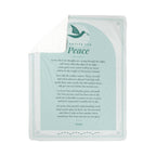 Teal peace prayer blanket with folded corner showing soft sherpa back