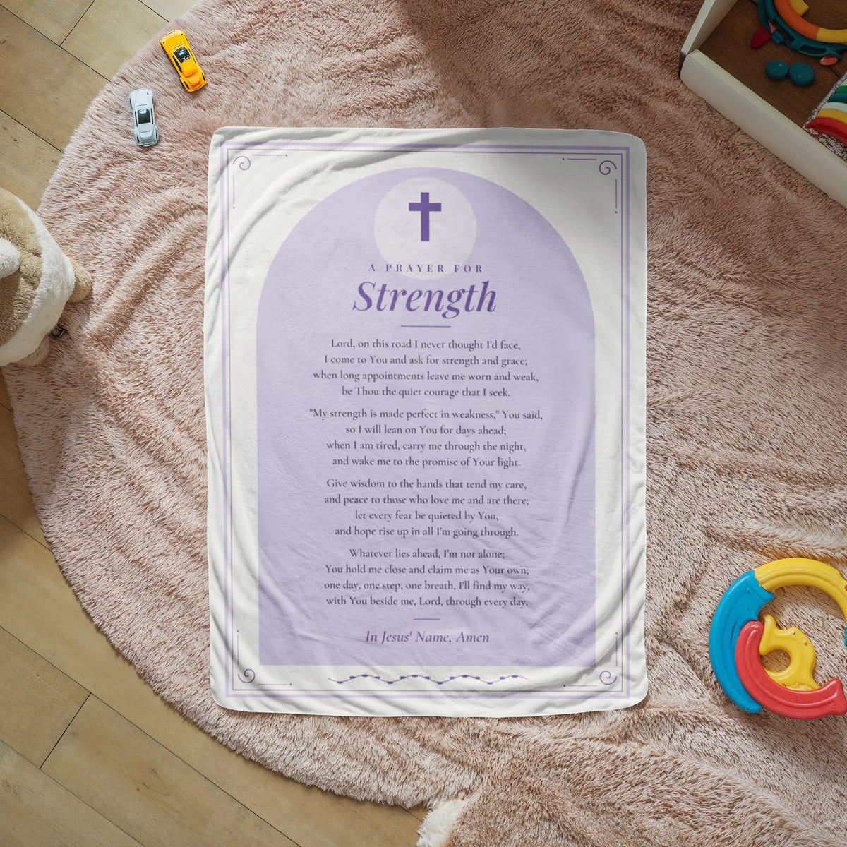 Lavender strength prayer blanket with printed prayer spread on a cozy rug